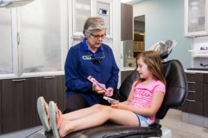 Consulting a child on healthy brushing habits