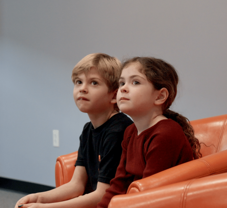 Two children at the dentist office